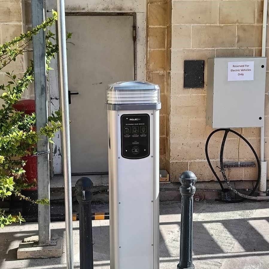 White Quantum charger installed outdoors